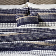 Graham Plaid Quilt styled on bed – Cozy Tartan Bedding Set
